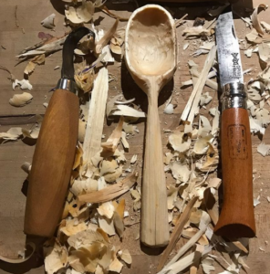 An assortment of tools on a table from Marine Mills Folk School's Open Carving community event.