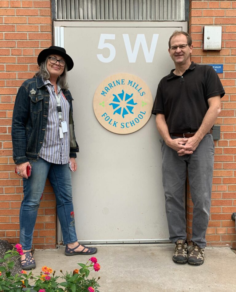 MMFS Board Members stand outside, ready to welcome you to the folk school.