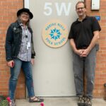 MMFS Board Members stand outside, ready to welcome you to the folk school.