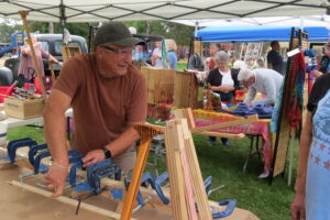 Demonstrating building wooden paddles at the Marine Fall Festival