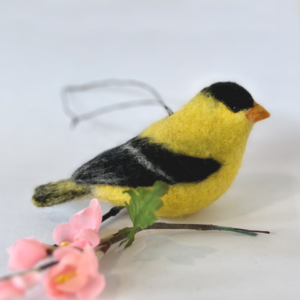 goldfinch with flowers